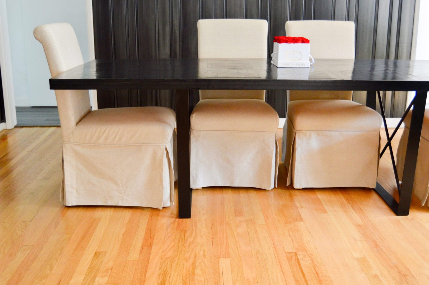 a room with table and chairs on luxury vinyl