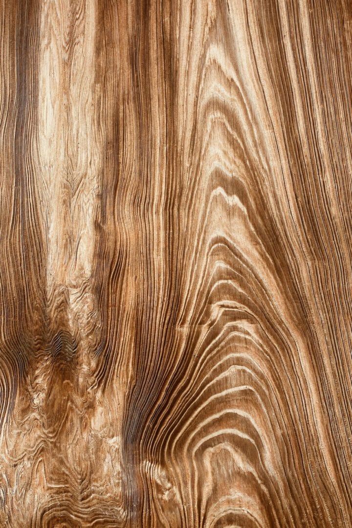 an image of a hardwood floor plank with bold stain