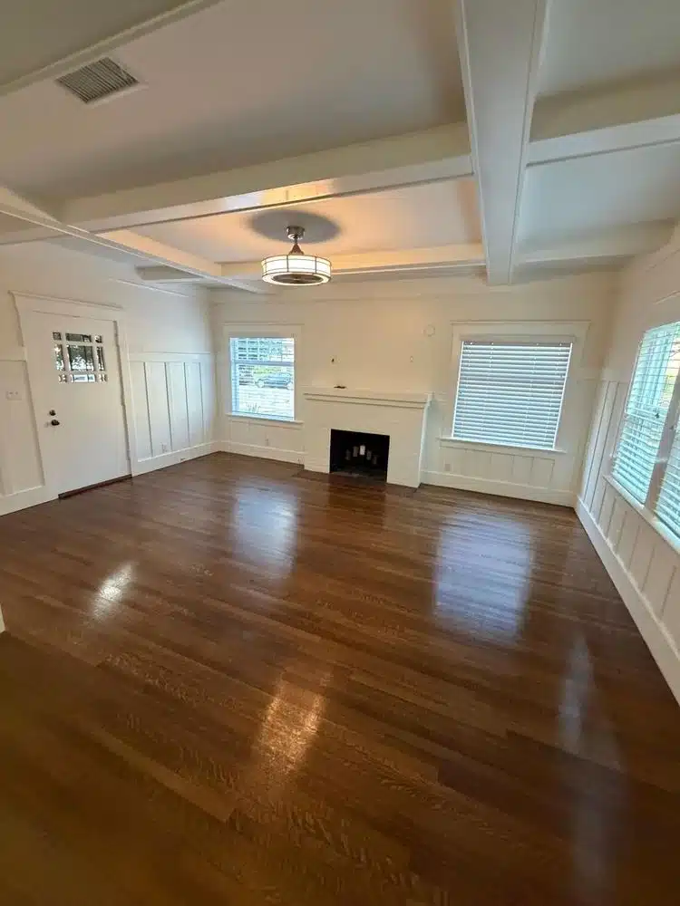 SPC flooring repair and refinishing in bright living area