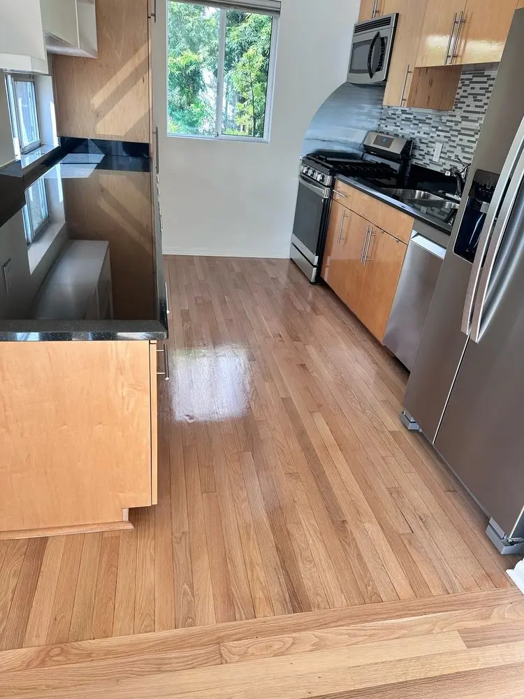 Sand and refinish hardwood floors in Santa Monica kitchen natural wood finish